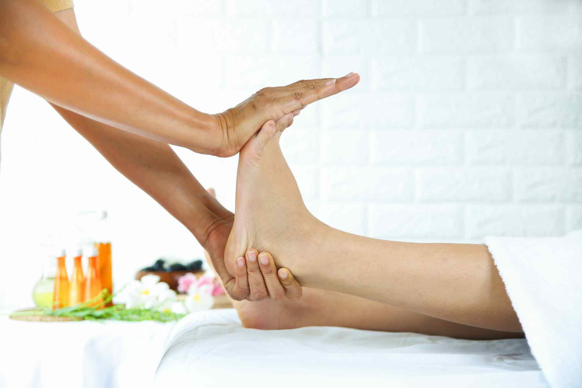 Close-up of a foot in discomfort, highlighting the strain associated with plantar fasciitis